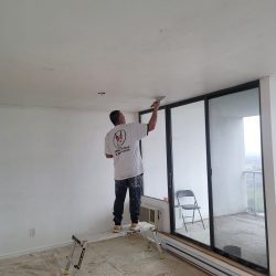 SMA Painting team painting a ceiling